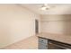 Kitchen featuring a breakfast bar, tile floors and off white walls at 3730 Greenwood Dr, Las Vegas, NV 89103