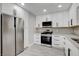 Modern kitchen with stainless steel appliances and ample counter space and cabinet space at 3998 Foxgrove Dr, Las Vegas, NV 89147