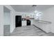 This kitchen features white cabinets, modern appliances, and gray backsplash at 402 Bell Ave, Henderson, NV 89015