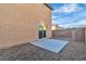 A view of the backyard featuring a patio and desert landscaping at 4228 Hickman Ct, Las Vegas, NV 89129