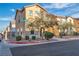 Two-story home featuring neutral siding, two-car garage, balcony, and low-maintenance landscaping at 4228 Hickman Ct, Las Vegas, NV 89129