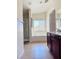Bright bathroom featuring tile flooring, neutral walls, tub, shower, and vanity at 4562 White Cap Mill St, Las Vegas, NV 89147