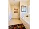 Bathroom with a large soaking tub, a window, and decorative accents at 4562 White Cap Mill St, Las Vegas, NV 89147