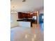 Open kitchen features a breakfast bar, stainless steel appliances, and granite countertops at 4562 White Cap Mill St, Las Vegas, NV 89147