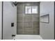 Shower and alcove in a renovated bathroom with modern fixtures at 4629 Lilliput Ln, Las Vegas, NV 89102