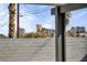 View of the city skyline featuring prominent buildings beyond a block wall at 4629 Lilliput Ln, Las Vegas, NV 89102