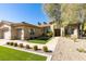 Beautifully landscaped front yard with lush green grass and stone pathway leading to the entrance at 4635 Bird View Ct, Las Vegas, NV 89129