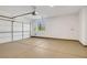 Spacious garage with sealed concrete floors, storage space, and a window at 4718 Atlantico St, Las Vegas, NV 89135