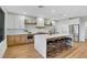 Bright kitchen with an island with seating, wood cabinets, and stainless steel appliances at 4718 Atlantico St, Las Vegas, NV 89135