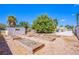 Backyard featuring garden beds, mature trees, and a private yard at 4871 Reiter Ave, Las Vegas, NV 89108