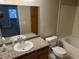 Bathroom featuring granite vanity and combination tub and shower offers comfort and convenience at 5055 W Hacienda Ave # 1028, Las Vegas, NV 89118