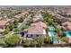 Backyard oasis with a pool and mature landscaping viewed from above in a neighborhood setting at 5271 Villa Vecchio Ct, Las Vegas, NV 89141