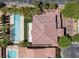 Aerial shot of a home with a long swimming pool, spa, and a beautifully designed tile roof at 5271 Villa Vecchio Ct, Las Vegas, NV 89141