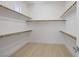 Organized walk-in closet featuring ample shelving and storage space at 5271 Villa Vecchio Ct, Las Vegas, NV 89141