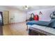 Bedroom featuring tiled flooring, a closet with sliding doors, and modern decor at 5385 Ravendale Cir, Las Vegas, NV 89120