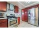 Updated kitchen featuring stainless steel appliances and plentiful cabinet storage at 5385 Ravendale Cir, Las Vegas, NV 89120