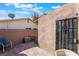 Secluded outdoor patio area with secure gated door at 5385 Ravendale Cir, Las Vegas, NV 89120