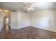 Bedroom features hardwood floors and a ceiling fan at 5452 Green Palms St, Las Vegas, NV 89130