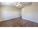 Bedroom featuring hardwood floors and a ceiling fan at 5452 Green Palms St, Las Vegas, NV 89130