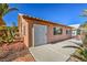 Exterior view of home and backyard patio at 5452 Green Palms St, Las Vegas, NV 89130