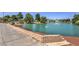 Scenic pond featuring a fountain and swan, enhancing the beauty and tranquility of the community at 5452 Green Palms St, Las Vegas, NV 89130