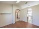 Bright room with ceramic tile floors, arched doorways, and neutral paint, providing a welcoming atmosphere at 5452 Green Palms St, Las Vegas, NV 89130