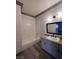 Updated bathroom boasts a vanity and a shower-tub combination at 5525 W Flamingo Rd # 1020, Las Vegas, NV 89103