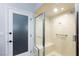 Updated shower featuring showerhead and bench at 5601 Cavalier Cir, Las Vegas, NV 89130