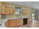 Functional kitchen featuring light-colored cabinets and wood-look flooring at 5976 Ancona Dr, Las Vegas, NV 89141