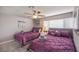 This bedroom features two beds and contemporary decor at 5990 Mcleod Dr, Las Vegas, NV 89120