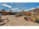 Backyard with fire pit, trampoline, and potential for gardening and other outdoor activities at 604 Canyon Rd, Henderson, NV 89002