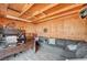 Finished shed used as office with wood paneling, desk, seating, and plenty of natural light at 604 Canyon Rd, Henderson, NV 89002