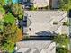 An aerial view shows the design and roof of a home with a backyard oasis with pool, firepit, and covered patio at 613 Pinnacle Heights Ln, Las Vegas, NV 89144