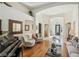 Bright living room features hardwood floors, archways, and ample natural light at 613 Pinnacle Heights Ln, Las Vegas, NV 89144