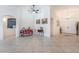 Bright and airy living room with tile floors, archways, decorative furnishings, and an open layout at 6608 Ringbill Ct, North Las Vegas, NV 89084