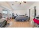 Spacious main bedroom featuring a window seat and modern decor at 6608 Ringbill Ct, North Las Vegas, NV 89084