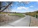 Scenic view of a golf course path, highlighting the natural beauty of the surroundings at 704 Peachy Canyon Cir # 101, Las Vegas, NV 89144