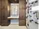 Chic bathroom with custom vanities, cabinetry, and a hexagon tiled glass enclosed shower at 77 Chapman Heights St, Las Vegas, NV 89138