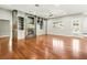 Stylish living room with hardwood floors, a modern fireplace, and custom built-in shelving at 77 Chapman Heights St, Las Vegas, NV 89138