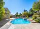 Backyard pool and spa with outdoor BBQ at 77 Chapman Heights St, Las Vegas, NV 89138