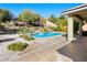 Backyard pool with a view of landscaping and trees at 77 Chapman Heights St, Las Vegas, NV 89138