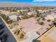 Stunning aerial view of a desert landscape with a single-story house at 7860 Thunder Echo St, Las Vegas, NV 89131