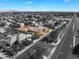 Expansive aerial view of a single-story home with lush landscaping in a quiet neighborhood of Las Vegas at 7860 Thunder Echo St, Las Vegas, NV 89131