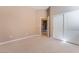 Empty bedroom with plush carpet and closet at 7860 Thunder Echo St, Las Vegas, NV 89131