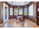 Cozy breakfast nook with a glass table and chairs, adjacent to the kitchen at 7860 Thunder Echo St, Las Vegas, NV 89131