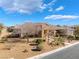 Charming single-story home with a tile roof and desert landscaping at 7860 Thunder Echo St, Las Vegas, NV 89131