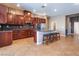 A spacious kitchen with granite countertops, a center island, and stainless steel appliances at 7860 Thunder Echo St, Las Vegas, NV 89131