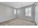 Empty bedroom features neutral paint, carpet floors, and plantation shutters at 7870 Formitch Ct, Las Vegas, NV 89166