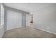 Empty bedroom with carpet floors, neutral paint, and double door closet at 7870 Formitch Ct, Las Vegas, NV 89166