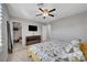 Bedroom boasts carpet floors, ceiling fan, and a three-drawer chest at 7870 Formitch Ct, Las Vegas, NV 89166